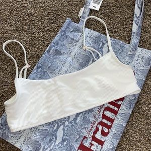 Frankie’s white boots top